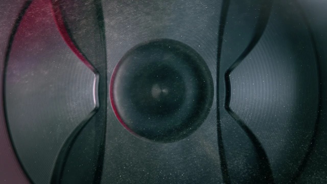 Video Reference: close up, technology, macro photography, circle, audio, audio equipment, Person