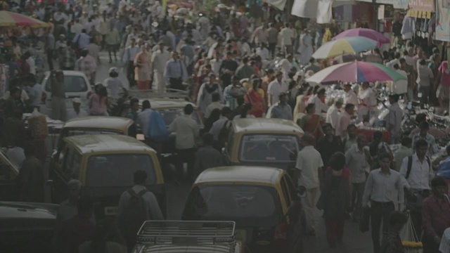 Video Reference: Crowd, People, Motor vehicle, Vehicle, Mode of transport, Traffic, Car, Traffic congestion, Event, Audience, Person