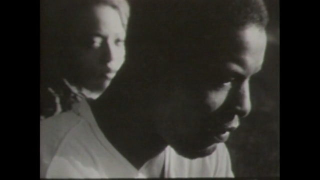 Video Reference: man, person, gentleman, human, film, darkness, mouth, facial hair, midnight