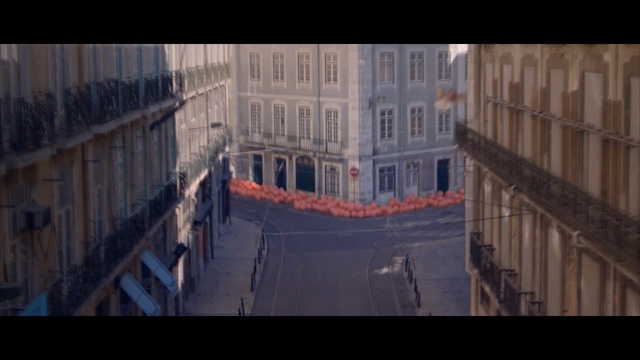 Video Reference: building, sky, metropolis, urban area, screenshot, facade, window, city, Person