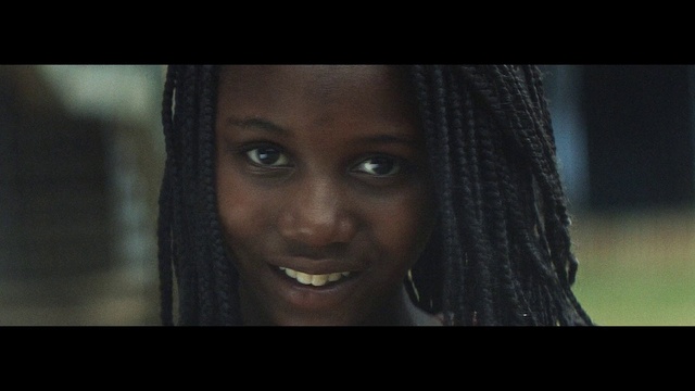 Video Reference: Face, Hair, Black, Facial expression, Nose, Eyebrow, Hairstyle, Lip, Head, Cheek