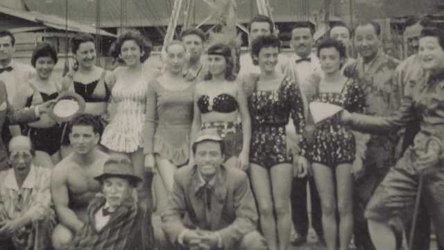 Video Reference: people, photograph, social group, crowd, black and white, team, history, crew, vintage clothing, monochrome, Person