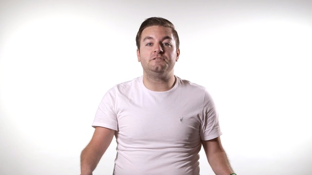 Video Reference: t shirt, shoulder, chin, neck, standing, arm, muscle, sleeve, facial hair, Person