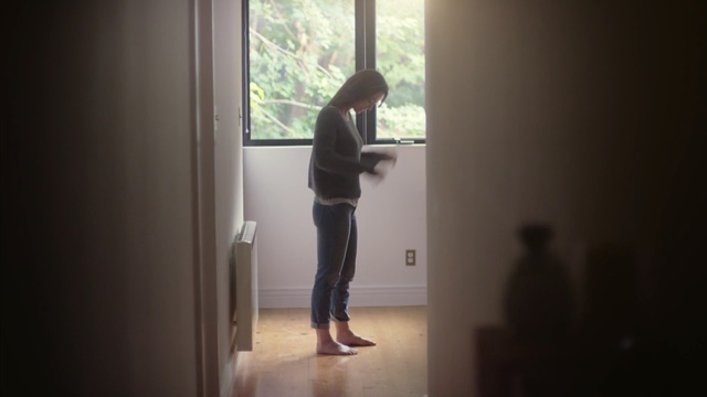 Video Reference: white, photograph, black, standing, room, day, light, house, snapshot, photography, Person