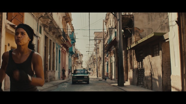 Video Reference: street, road, urban area, town, infrastructure, alley, city, screenshot, sky, girl, Person