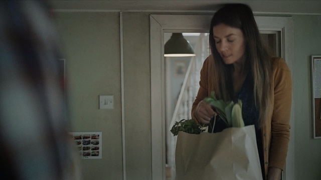 Video Reference: Standing, Room, Outerwear, Long hair, Jacket, Interior design, Top, Door, Black hair, Person