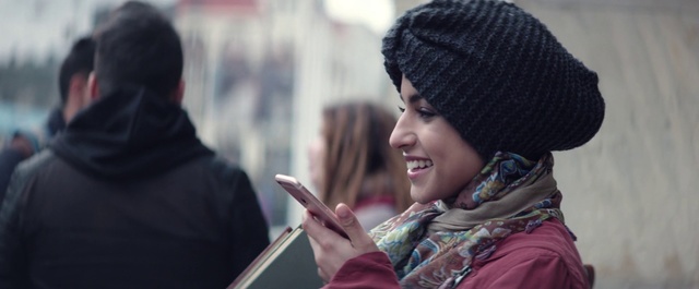 Video Reference: Facial expression, People, Knit cap, Smile, Beanie, Human, Headgear, Temple, Photography, Tradition