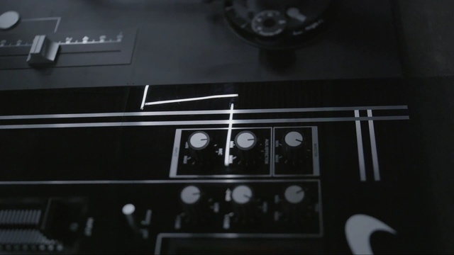 Video Reference: black, electronics, technology, electronic instrument, musical instrument accessory, black and white, darkness, sound, electronic device, multimedia