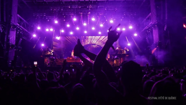 Video Reference: Performance, Entertainment, Concert, Rock concert, Performing arts, Stage, Purple, Crowd, Event, Violet