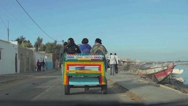 Video Reference: Mode of transport, Transport, Motor vehicle, Rickshaw, Vehicle, Asphalt, Road, Travel, Cart, Thoroughfare