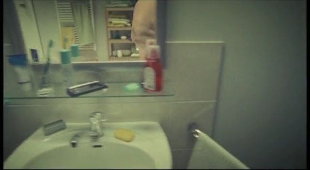 Video Reference: room, bathroom, toilet, plumbing fixture, sink, interior design, glass, Person