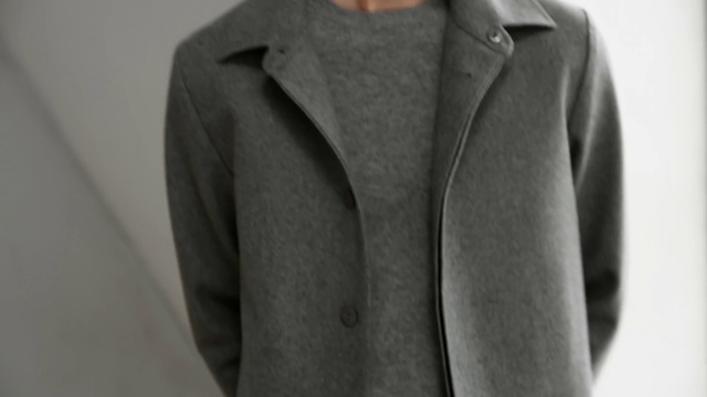 Video Reference: Clothing, Outerwear, Coat, Sleeve, Overcoat, Jacket, Collar, Fashion, Blazer, Formal wear, Person