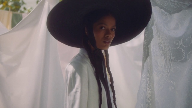Video Reference: Hat, Sun hat, Headgear, Black hair, Fashion accessory, Photography, Smile, Fedora, Sombrero