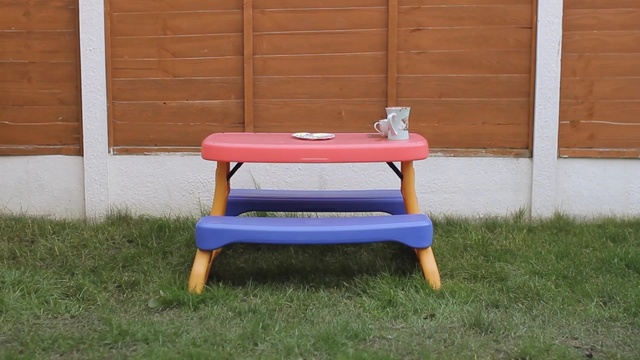 Video Reference: furniture, table, chair, grass, play, desk, outdoor furniture, bench