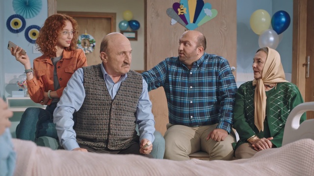 Video Reference: People, Grandparent, Event, Sitting, Fun, Adaptation, Room, Family, Retirement home, Family pictures