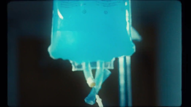 Video Reference: Blue, Aqua, Turquoise, Green, Light, Teal, Turquoise, Transparent material, Electric blue, Lighting accessory, Person