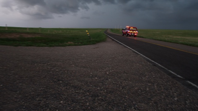 Video Reference: Asphalt, Road, Road surface, Mode of transport, Highway, Tar, Infrastructure, Ecoregion, Vehicle, Sky