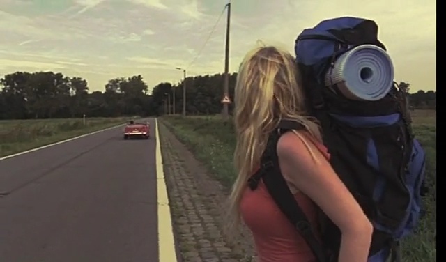 Video Reference: road, car, mode of transport, vehicle, girl, sky, driving, recreation, asphalt, lane