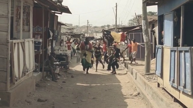 Video Reference: People, Residential area, Town, Mode of transport, Human settlement, Neighbourhood, Street, Suburb, Thoroughfare, Pedestrian, Person