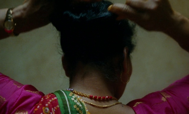 Video Reference: Hair, Hairstyle, Neck, Long hair, Black hair, Abdomen, Hand, Trunk, Sari, Temple