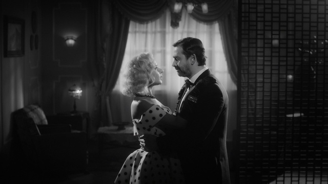 Video Reference: Flash photography, Curtain, Dress, Black-and-white, Coat, Gesture, Entertainment, Grey, Style, Happy