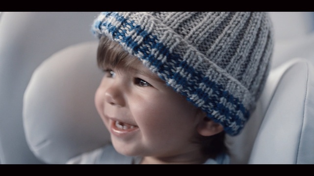 Video Reference: face, hat, headdress, portrait, shower cap, clothing, cap, bonnet, child, cute, person, eyes, hair, people