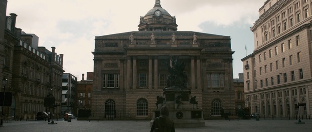 Video Reference: landmark, building, classical architecture, metropolis, town, urban area, town square, downtown, city, plaza, Person