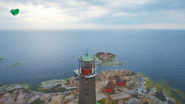 Video Reference: Promontory, Sea, Water, Cape, Coast, Sky, Tourism, Lighthouse, Ocean, Photography, Outdoor, Body, Boat, Table, Lake, Sitting, Food, Large, Man, Beach, People, Standing, Floating, River, Umbrella, Nature, Cloud, Shore