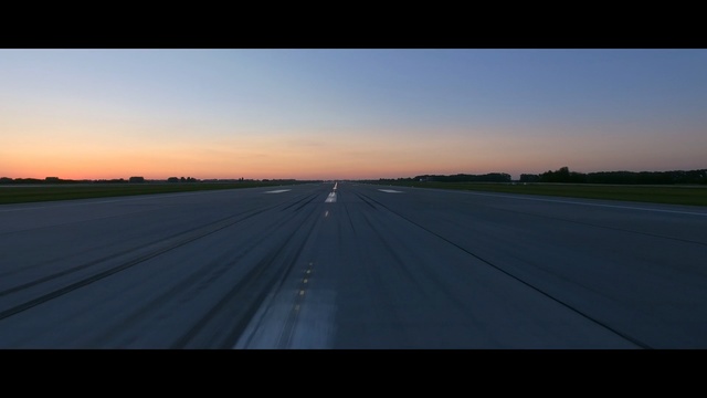 Video Reference: Sky, Horizon, Runway, Road, Morning, Evening, Dusk, Cloud, Infrastructure, Line