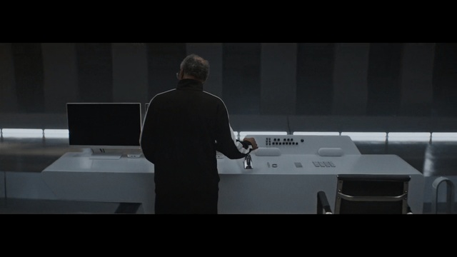 Video Reference: technology, darkness, screenshot, angle, sound, lecture, public speaking, Person