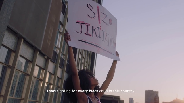 Video Reference: Advertising, Banner, Font, Protest, Billboard, Signage, City, Facade, Building