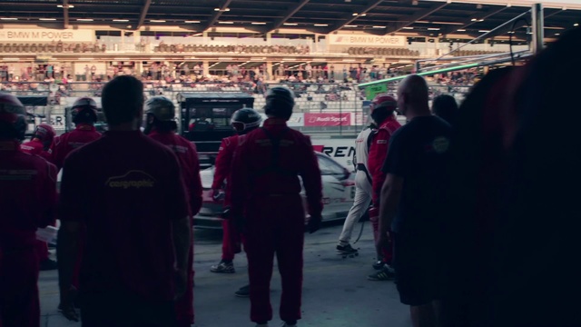 Video Reference: People, Red, Crowd, Snapshot, Sport venue, Stadium, Event, Photography, Arena, Competition event