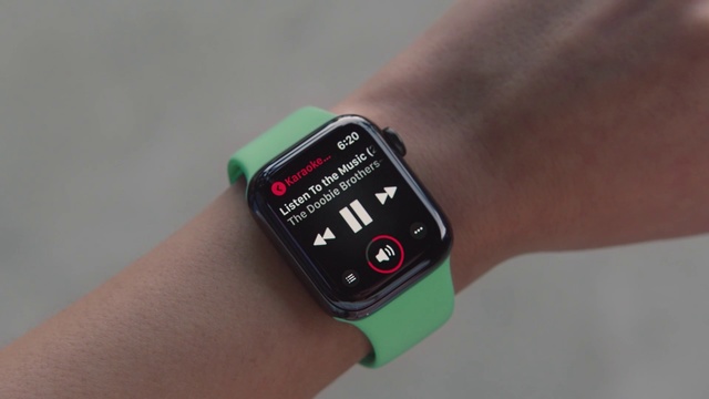 Video Reference: Wrist, Watch, Gadget, Technology, Watch phone, Finger, Electronic device, Hand, Heart rate monitor, Person, Indoor, Holding, Cellphone, Phone, Someone, Small, Camera, Man, Black, Green, Remote, Close, Shirt, Held, Player, Brush, Teeth, Yellow, Cat, Clock, Fashion accessory, Analog watch, Strap