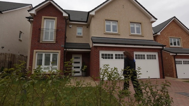 Video Reference: property, home, house, residential area, real estate, window, facade, building, estate, cottage, Person