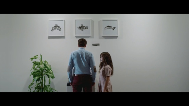 Video Reference: photograph, snapshot, standing, girl, fun, conversation, art exhibition, Person