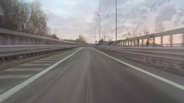 Video Reference: road, highway, lane, asphalt, infrastructure, transport, mode of transport, controlled access highway, road surface, sky