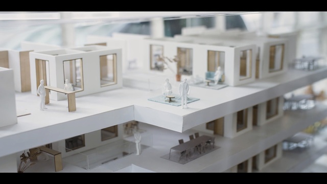 Video Reference: Scale model, Architecture, Property, House, Interior design, Table, Design, Furniture, Building, Room, Person