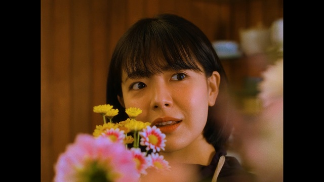 Video Reference: flower, face, yellow, skin, facial expression, smile, lady, nose, girl, beauty, Person