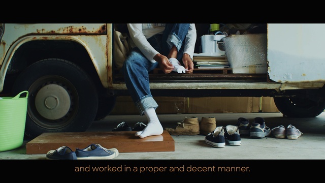 Video Reference: Footwear, Automotive wheel system, Shoe, Automotive tire, Photography, Photo caption, Wheel, Vehicle, Person, Man, Car, Photo, Front, Truck, Woman, Food, Table, Wearing, Standing, White, Clothing, Feet