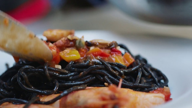 Video Reference: Cuisine, Food, Dish, Ingredient, Comfort food, Produce, Vegetarian food, Recipe, Italian food, Plate, Indoor, Piece, Slice, Sitting, Table, White, Fork, Topped, Cheese, Close, Sauce, Pizza, Black, Covered, Bun, Toppings, Dog, Meat, Hot, Cake, Fries, Fruit, Sandwich, Holding, Hotdog, Fast food, Seafood, Delicious, Vegetable, Piece de resistance