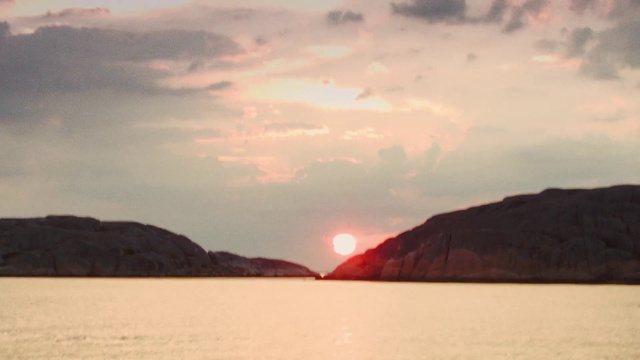 Video Reference: Sky, Body of water, Afterglow, Nature, Horizon, Sunset, Sea, Loch, Cloud, Atmospheric phenomenon