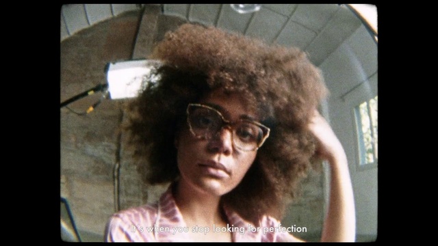 Video Reference: Hair, Afro, Hairstyle, Jheri curl, Human, Glasses, Fur, Eyewear, Black hair, Photo caption