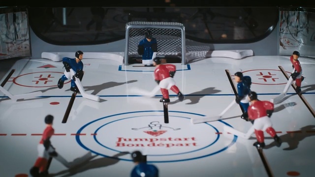 Video Reference: sport venue, team sport, structure, ice hockey, games, sports, ice, ice hockey position, recreation, indoor games and sports, Person