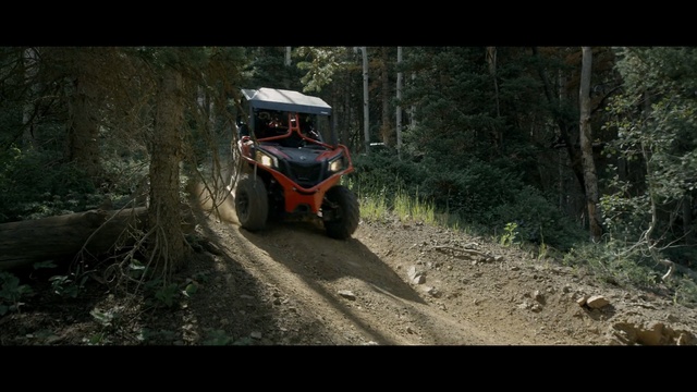 Video Reference: Land vehicle, Vehicle, Off-roading, All-terrain vehicle, Off-road vehicle, Jungle, Car, Mode of transport, Forest, Automotive tire, Person