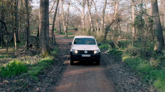 Video Reference: Land vehicle, Vehicle, Car, Off-roading, Off-road vehicle, Tree, City car, Road, Woodland, Forest