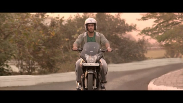 Video Reference: Motorcycle, Mode of transport, Vehicle, Motorcycling, Motor vehicle, Helmet, Asphalt, Tree, Headgear, Personal protective equipment
