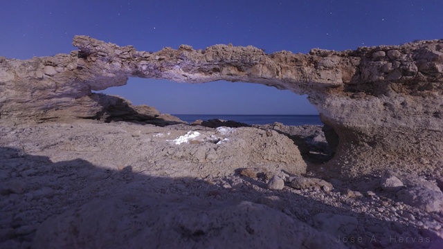 Video Reference: rock, natural arch, sky, sea, promontory, formation, coast, terrain, geology, badlands