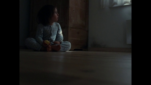 Video Reference: Child, Sitting, Floor, Darkness, Human, Flooring, Room, Window, Adaptation, Photography