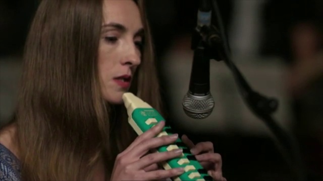 Video Reference: Lip, Long hair, Black hair, Brown hair, Singing, Singer, Microphone, Nail, Audio equipment, Smile