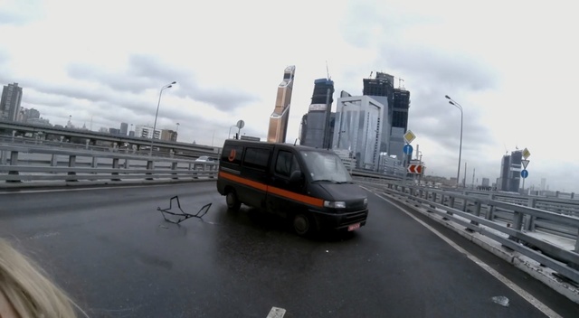 Video Reference: Land vehicle, Vehicle, Car, Transport, Mode of transport, Road, Lane, Infrastructure, Minivan, Traffic, Outdoor, Street, Truck, Side, Pulling, Riding, Track, Traveling, Train, Driving, Walking, Parked, Orange, Lot, Man, Woman, City, Highway, Parking, Red, Large, Standing, Board, Boat, Bus, Group, White, People, Sky, Van, Wheel, Way, Scene